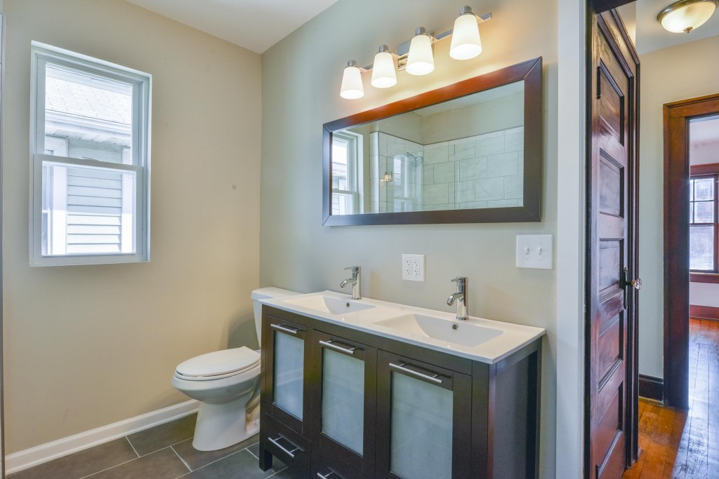 286 E Woodrow Avenue - Custom vanity, mirror, fixtures, & ceramic tile flooring